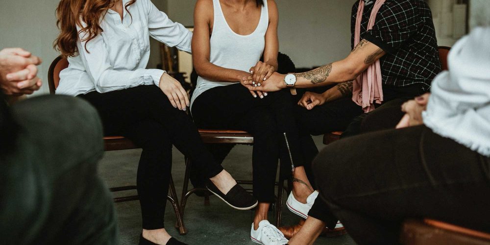 What to expect at an AA meeting and how it can help you recover from alcoholism.